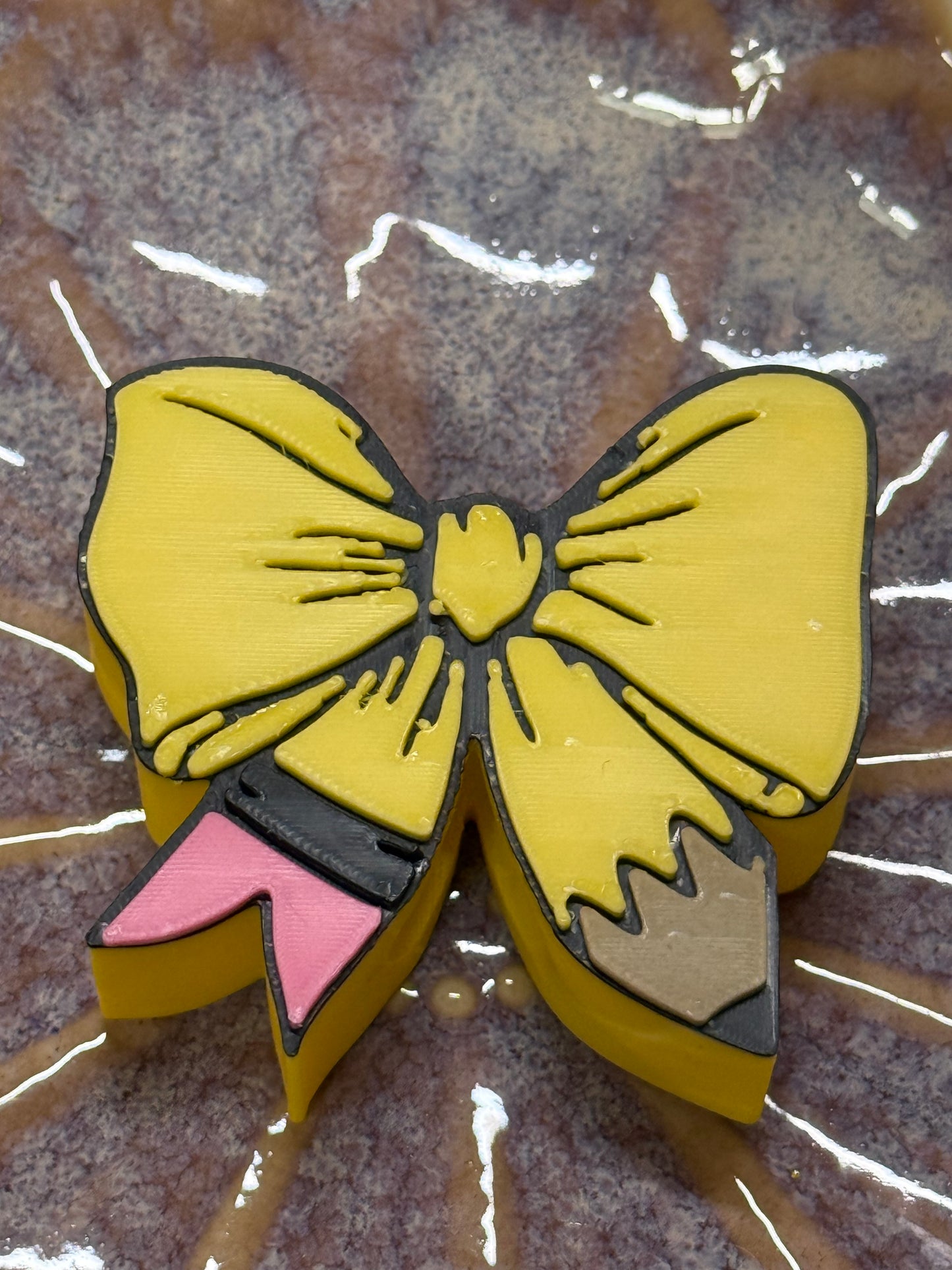 Pencil bow straw topper